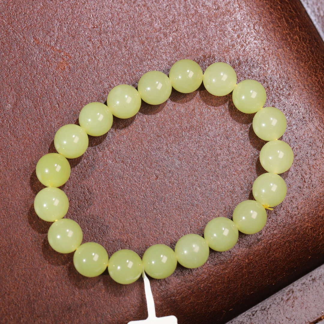 【小娟珠宝】1050 新疆若羌黄口圆珠手串   F042