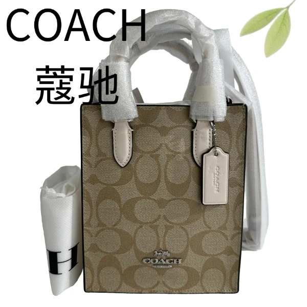 99新 COACH/蔻驰 老花拼白琴谱手提斜挎包G25116919底长14X17