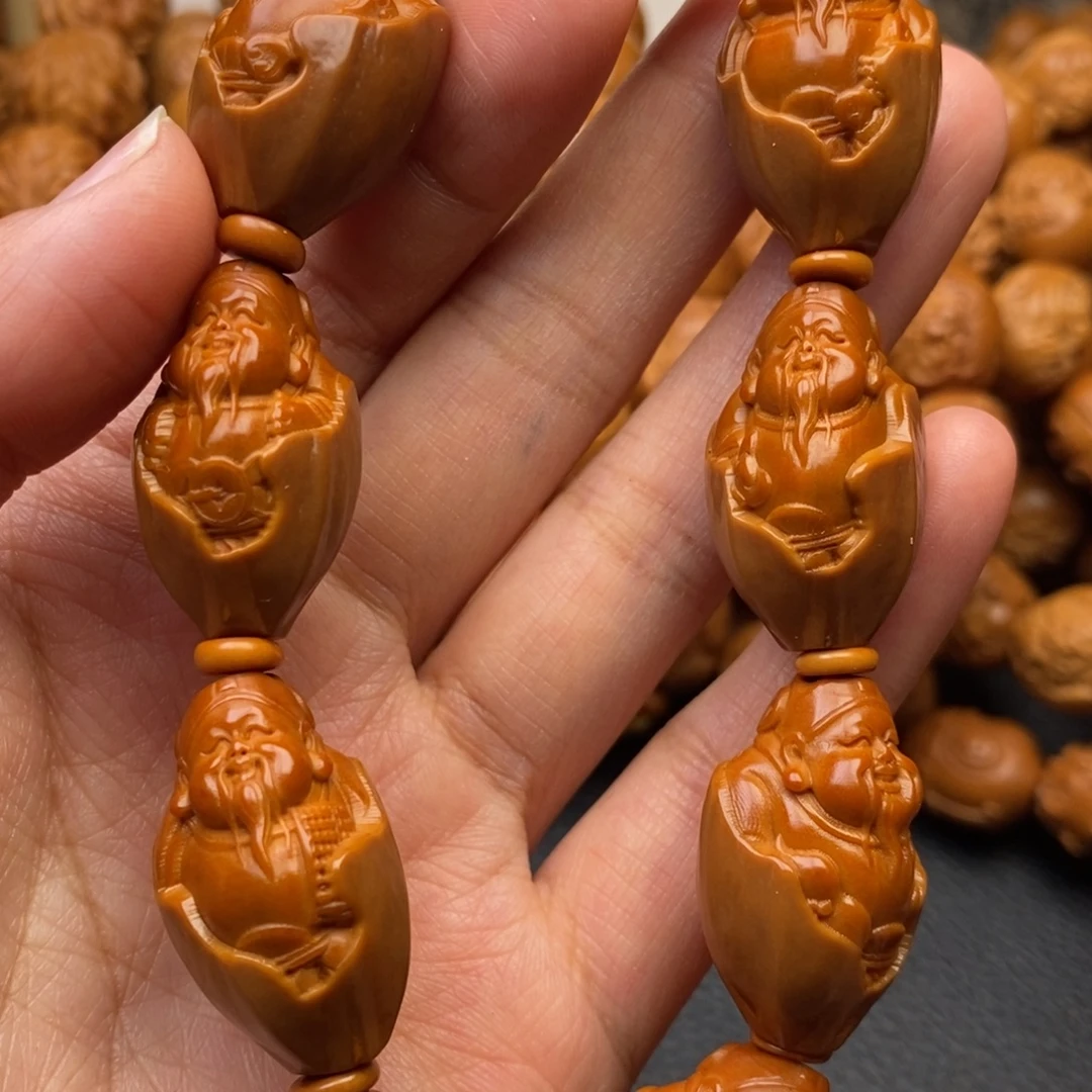 橄榄核手串包衣财神