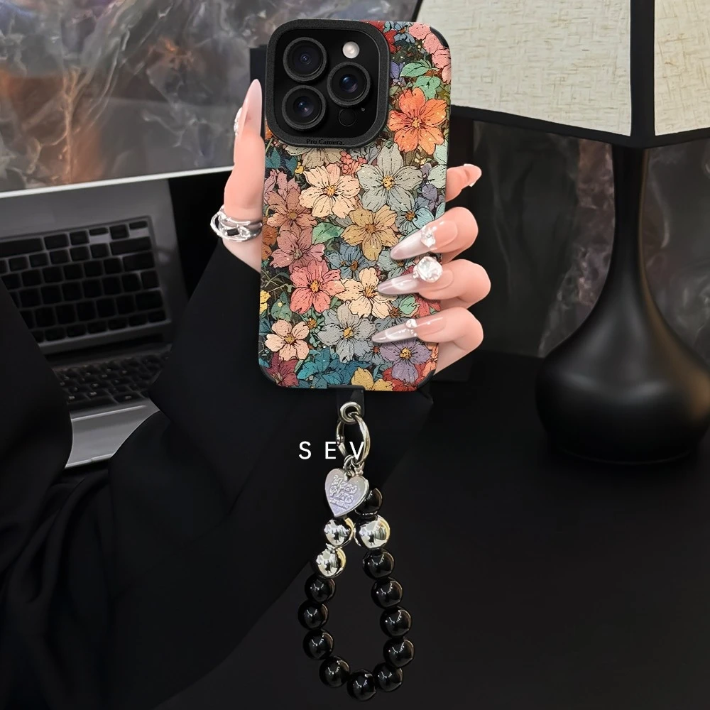 高颜值彩色花朵适用苹果17简约瞳眼羊巴皮手机壳华为OPPO小米VIVO