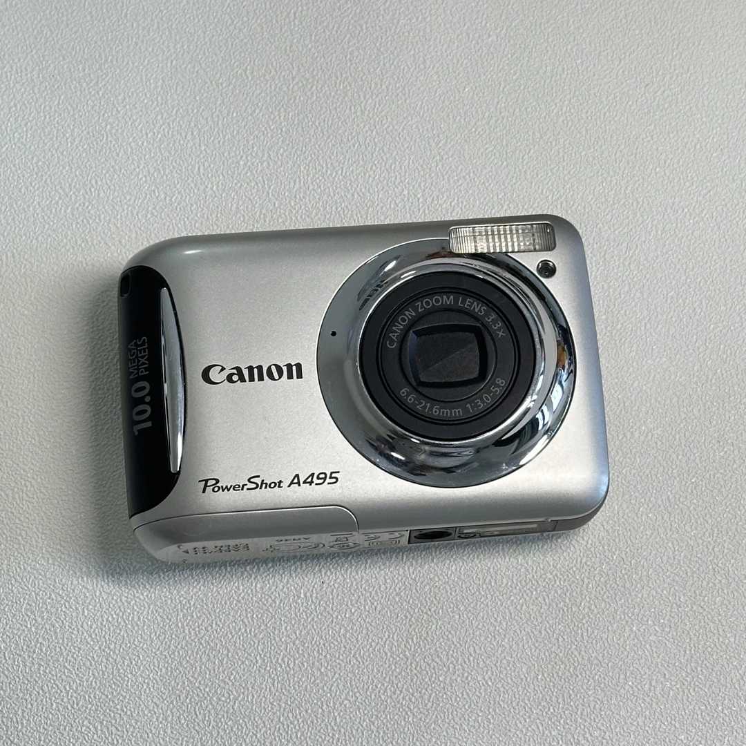 9新 Canon/佳能 A495 1000w像素3.3倍光变 自备5号电池 冷白皮CCD