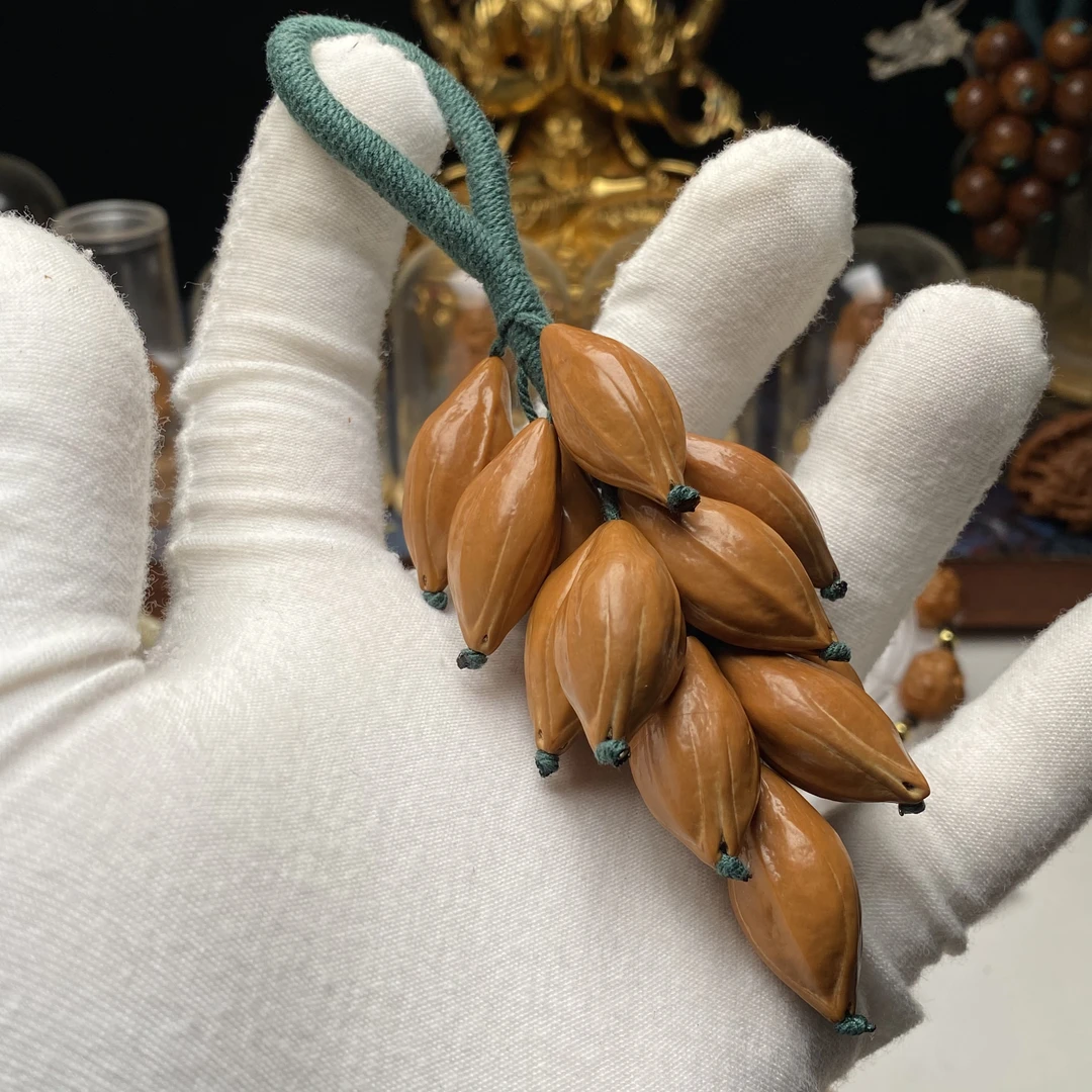 1.4小籽橄榄核雕素串手捻 包挂 葡萄串