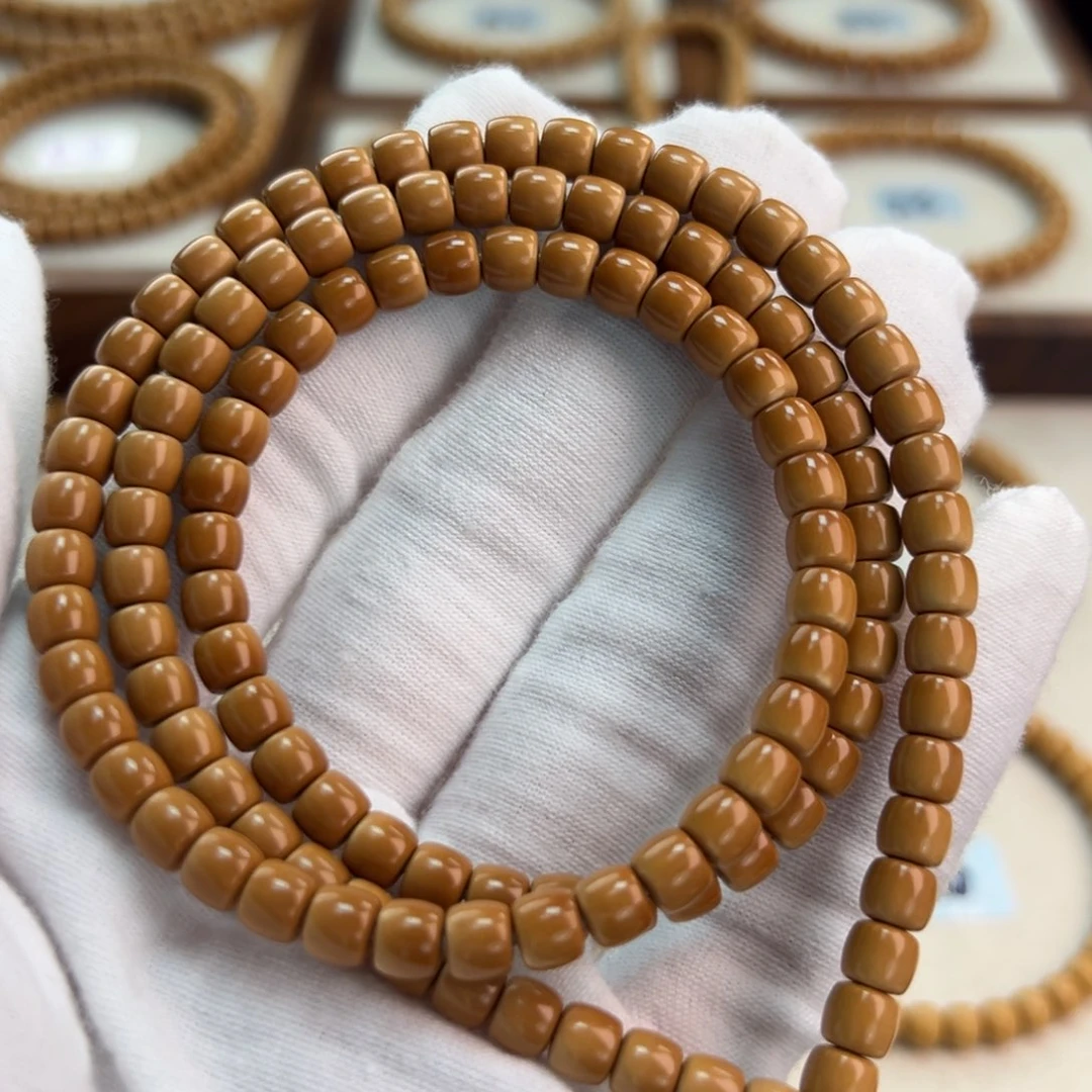 橄榄核手串5.7mm老挝老型108无白