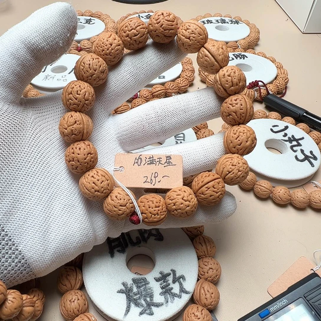 奔***师桃核手串1.6满天星