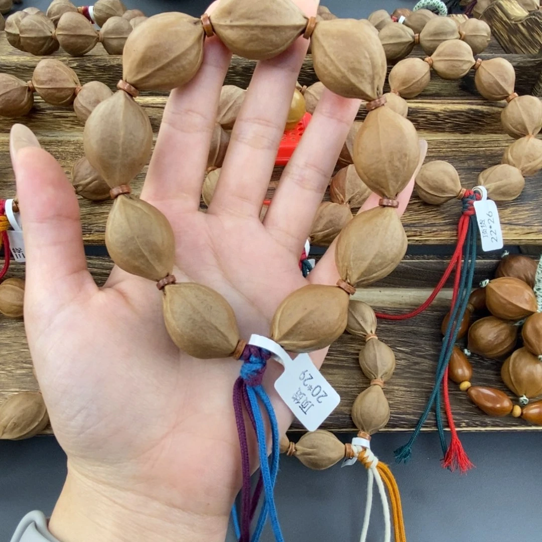 喝***豆橄榄核吊坠梅林铁核