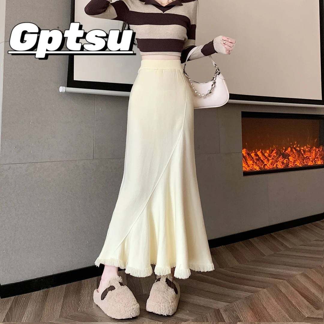 GPTSu杏色流苏半身裙秋冬新款高腰修身包臀设计感a字鱼尾长款裙子