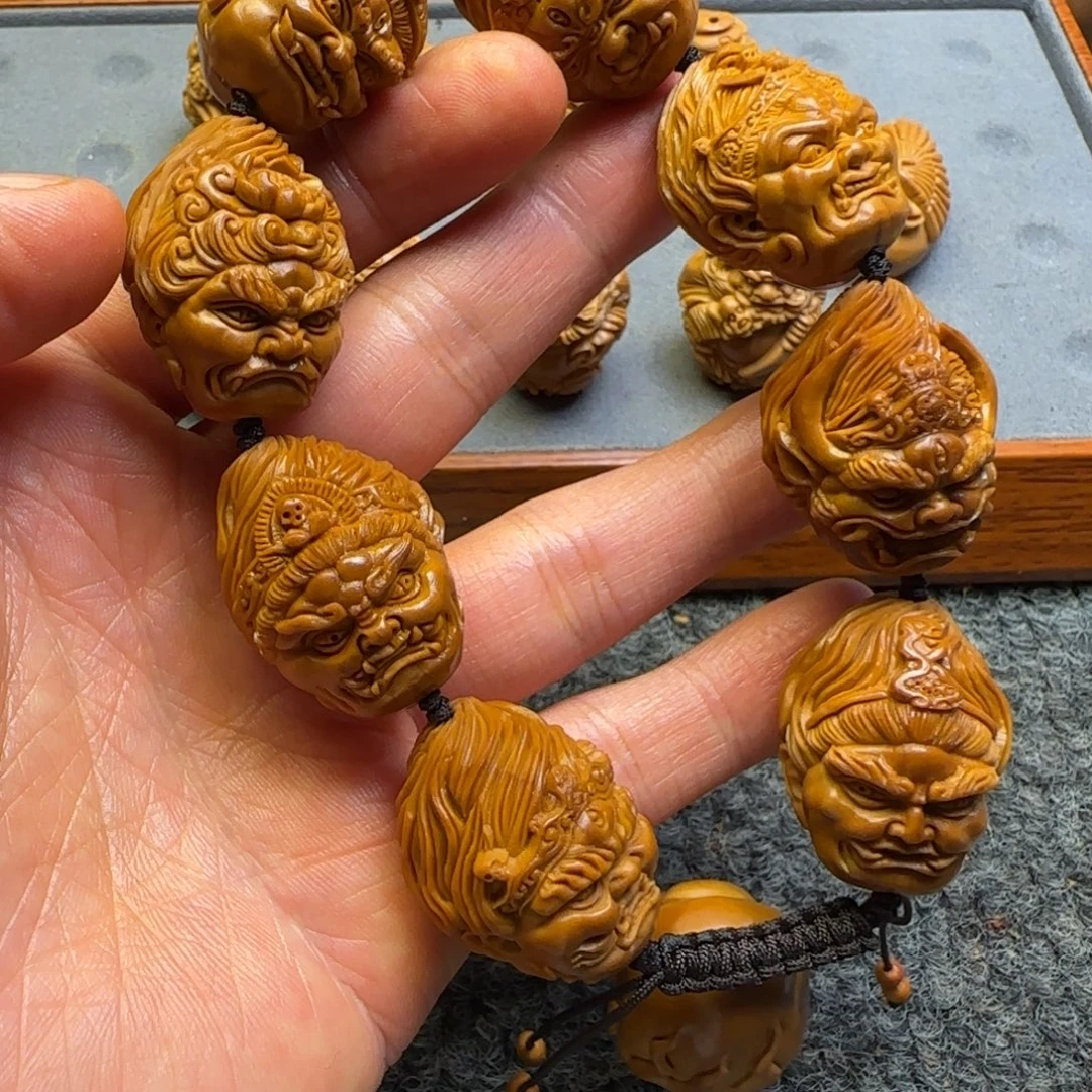 吊坠橄榄核冥王头呀