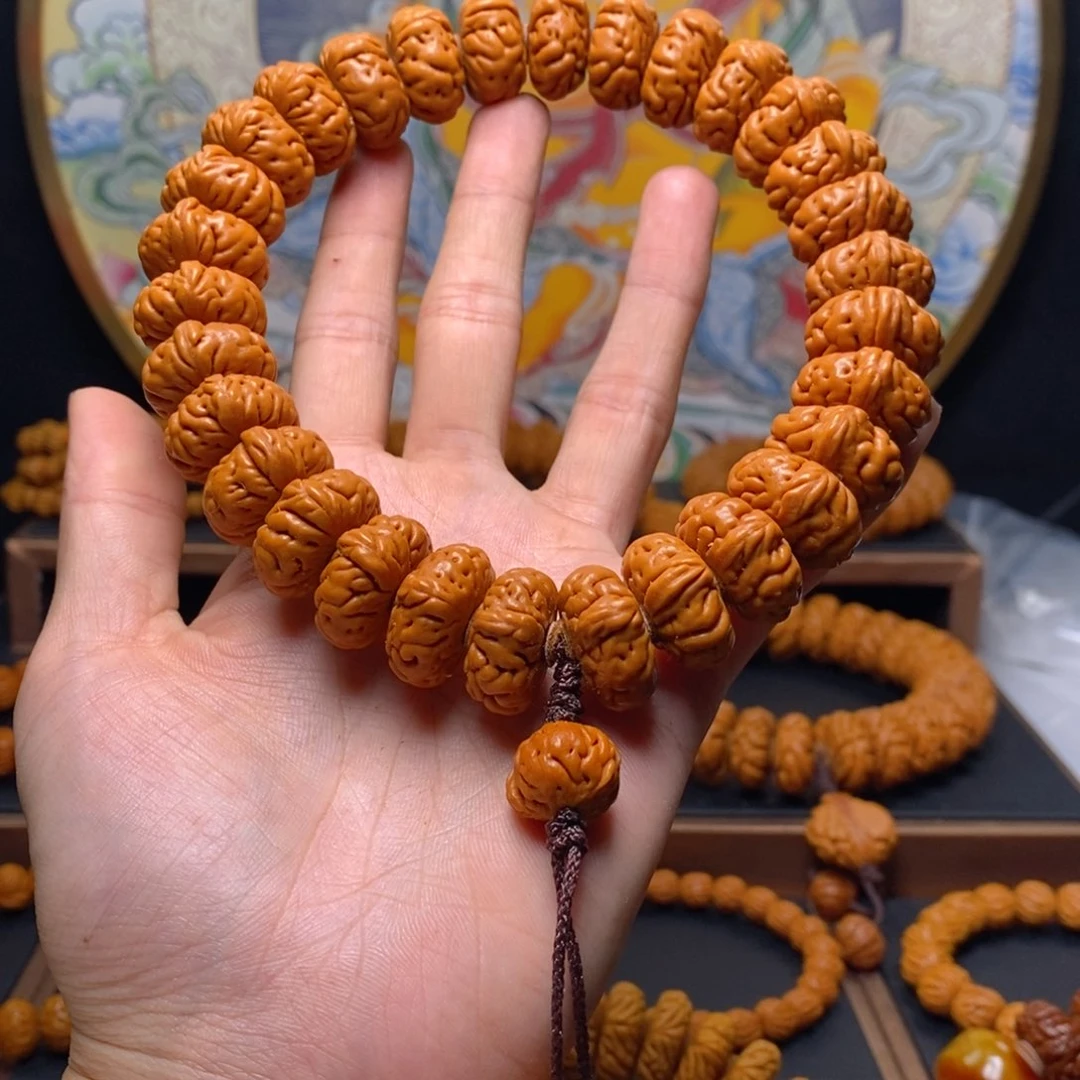 手串桃核旭*?龙纹桃核大肠