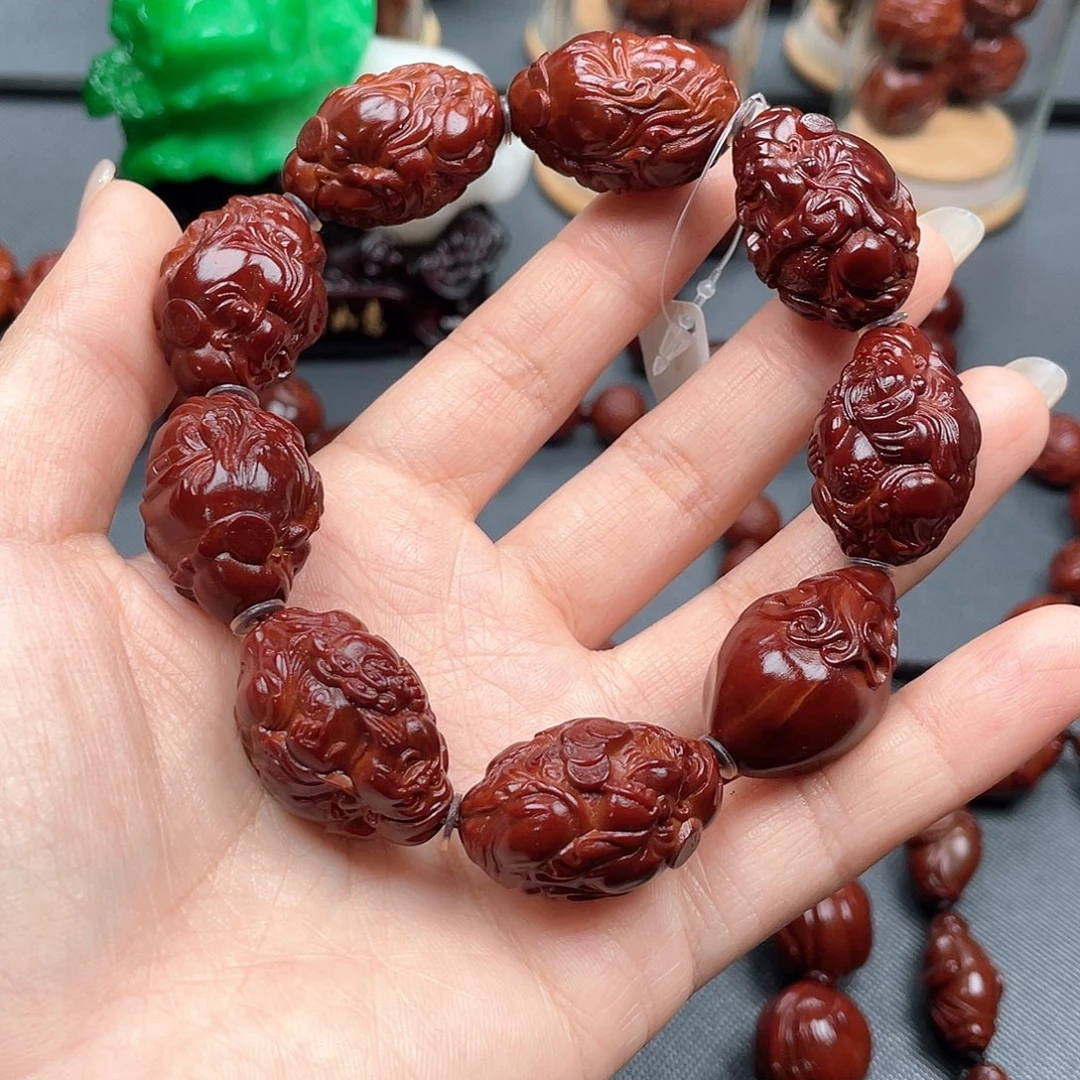 诚***人手串橄榄核财神手串