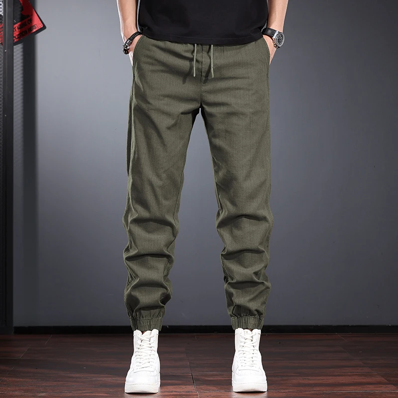 军绿色仿麻休闲裤男2025新款早秋宽松束脚哈伦裤纯棉百搭透气男裤