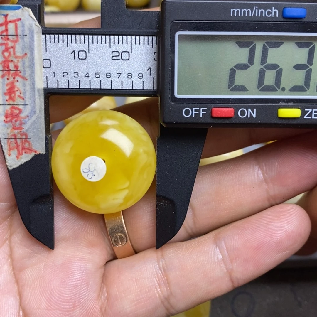 蜜蜡未镶嵌裸石26.3微粉扣子
