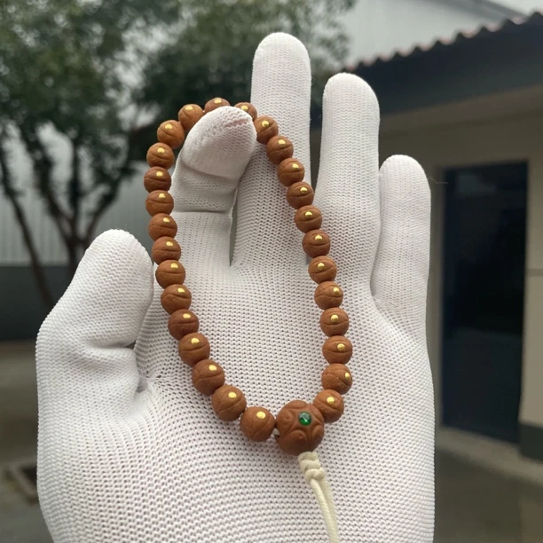 牛小度—“小凤眼”纯手工镶嵌，猴头手持。