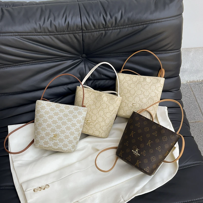 高级感老花手提水桶包包2025新款复古百搭单肩包小众设计斜挎包包