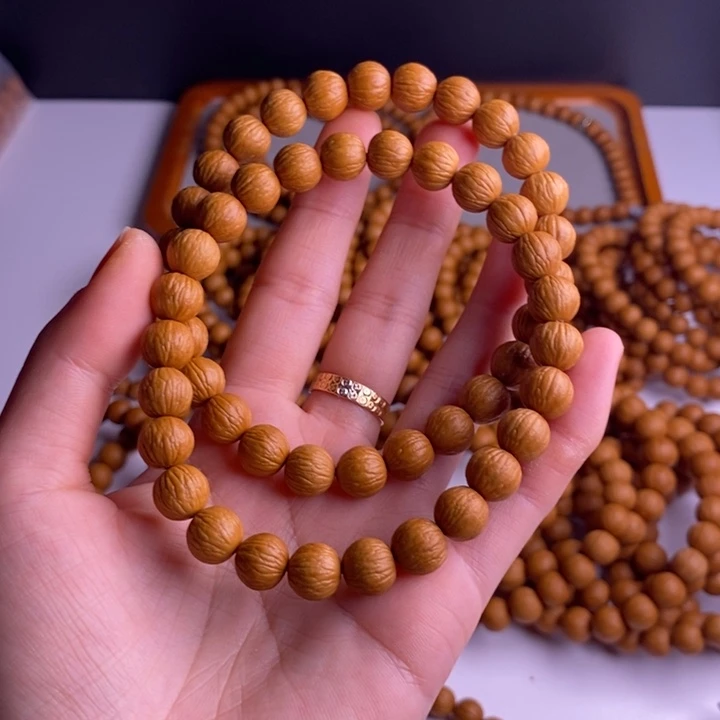 木***佳猴头核桃手串凤羽2条