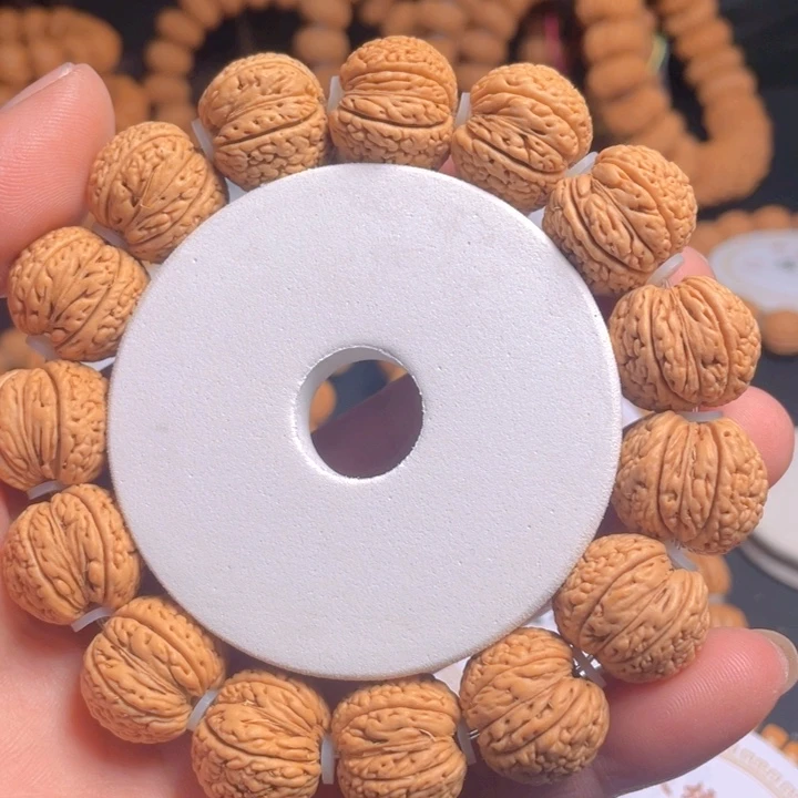 桃核吊坠L*凤羽手串