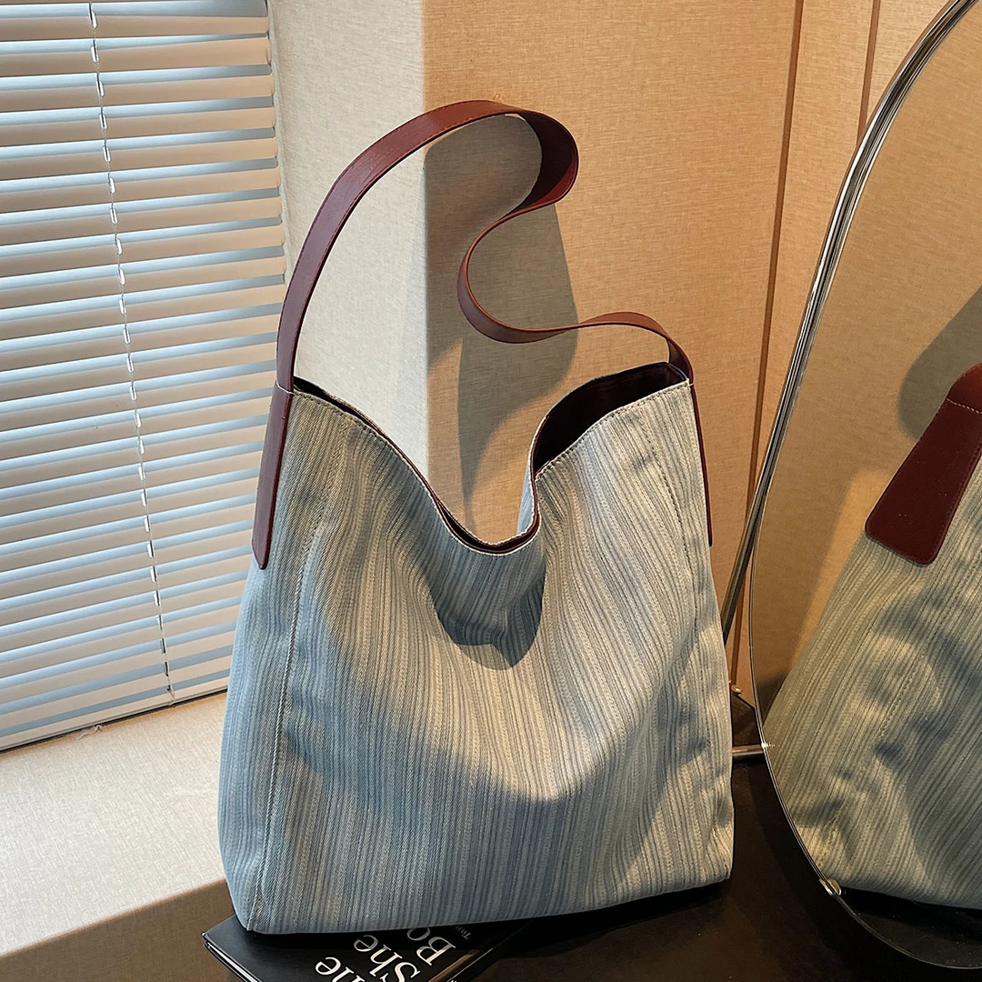 大容量托特包简约百搭条纹单肩包包女2025夏季新款时尚帆布水桶包