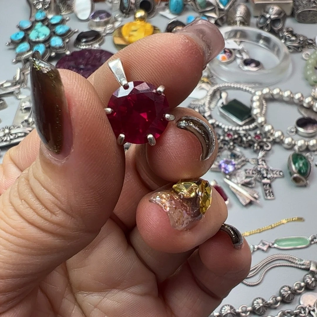 大***呀花岗石铁合金925银饰吊坠一个