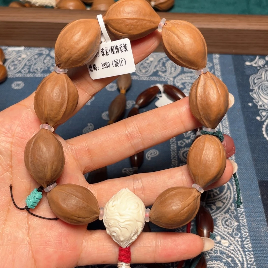 橄榄核吊坠铁核素串
