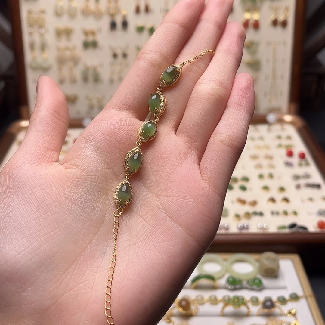 椰***o和田玉银S925镀金镶嵌耳饰