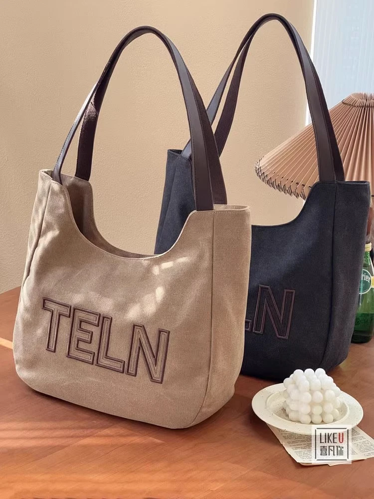 原创韩版字母刺绣文艺慵懒单肩帆布腋下包通勤时尚百搭学生托特包