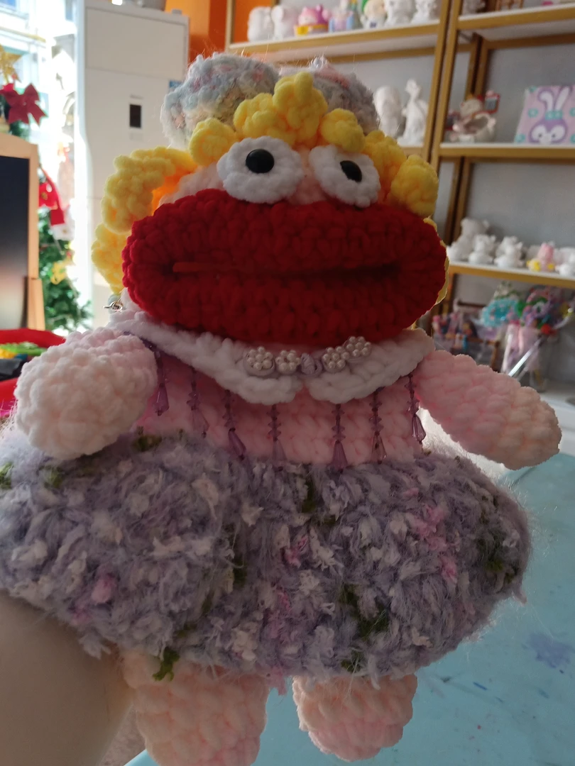 毛线钩织大嘴娃娃手机包