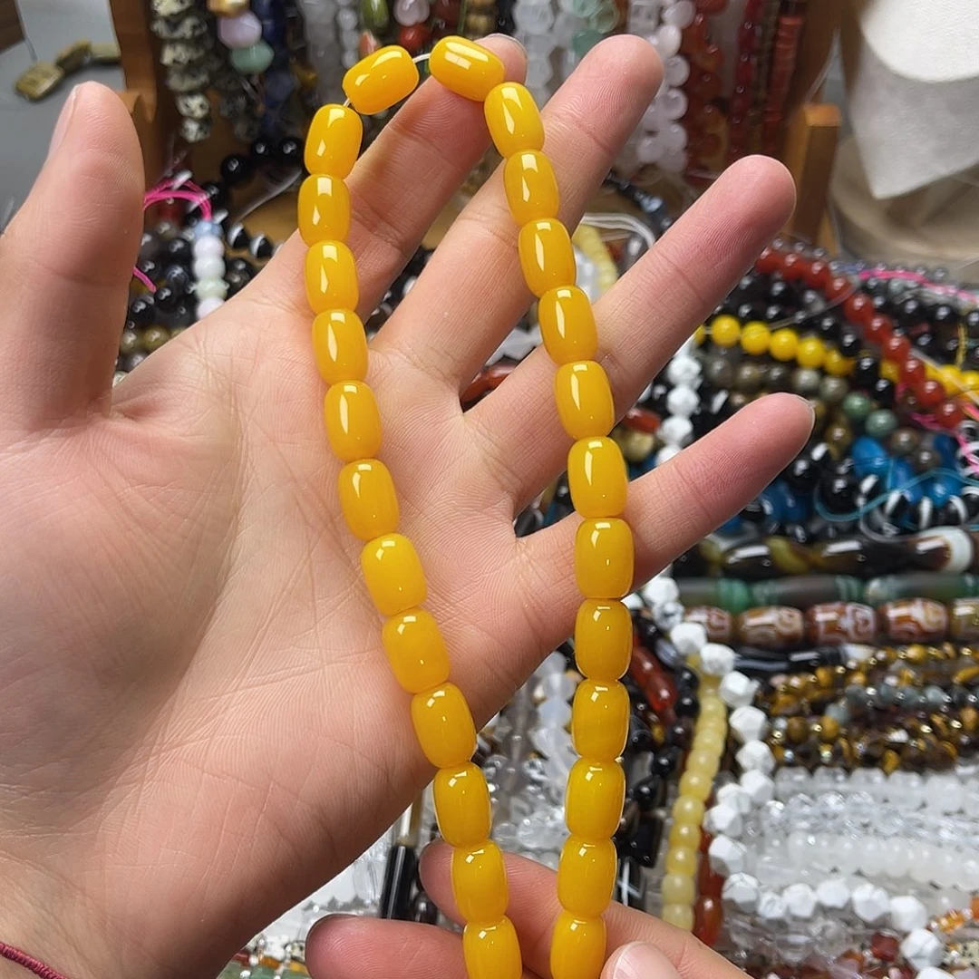 玛瑙/玉髓未镶嵌珠宝半成品10×14黄玛枣珠一条