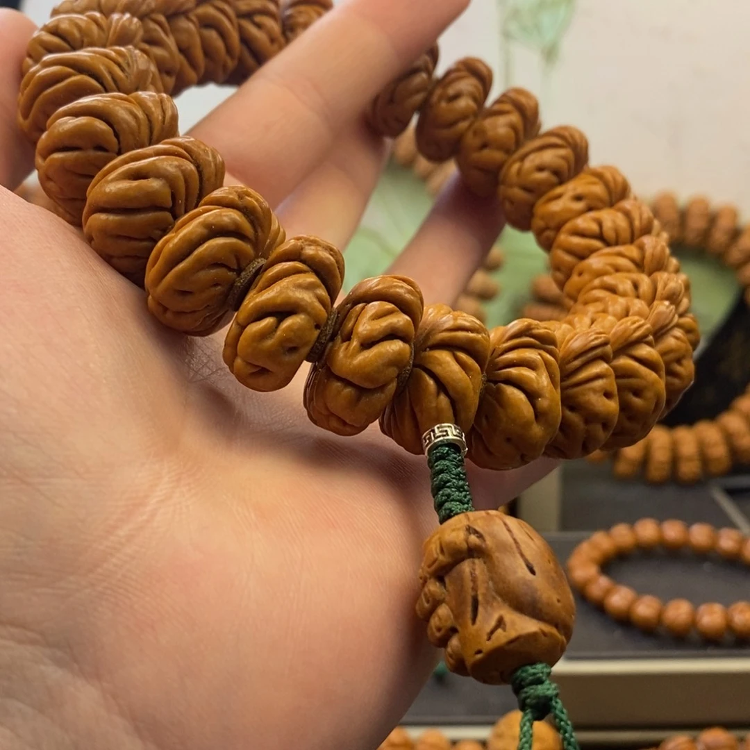 桃核手串7****823白玉龙手持