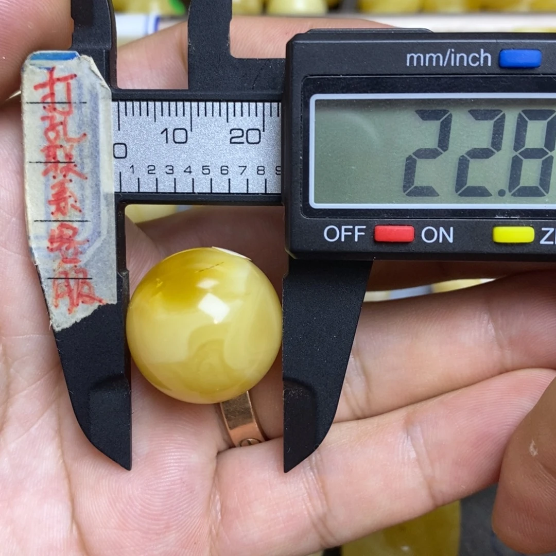 蜜蜡未镶嵌裸石22.8瑕疵圆珠默认直发
