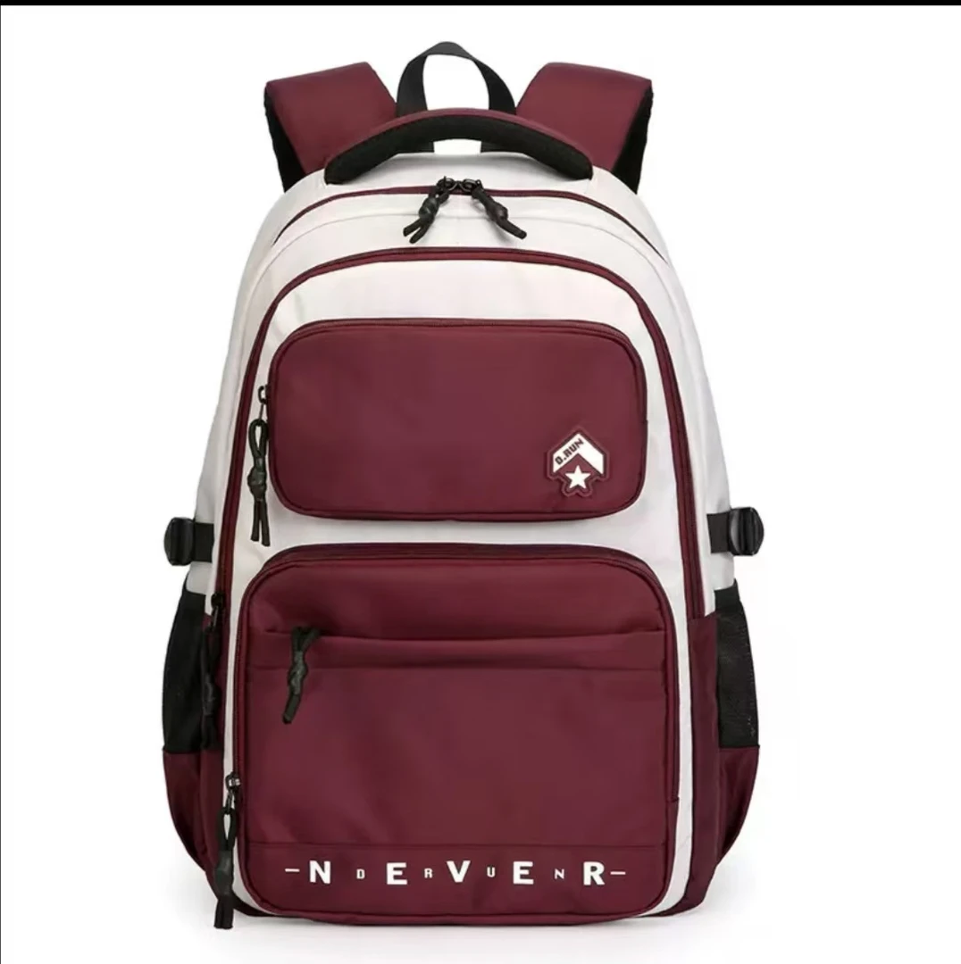 新款东润超轻简约双肩包五六年级初高中大学生书包休闲防泼水背包