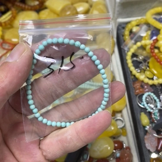 未镶嵌蜜蜡裸石云*玲手串