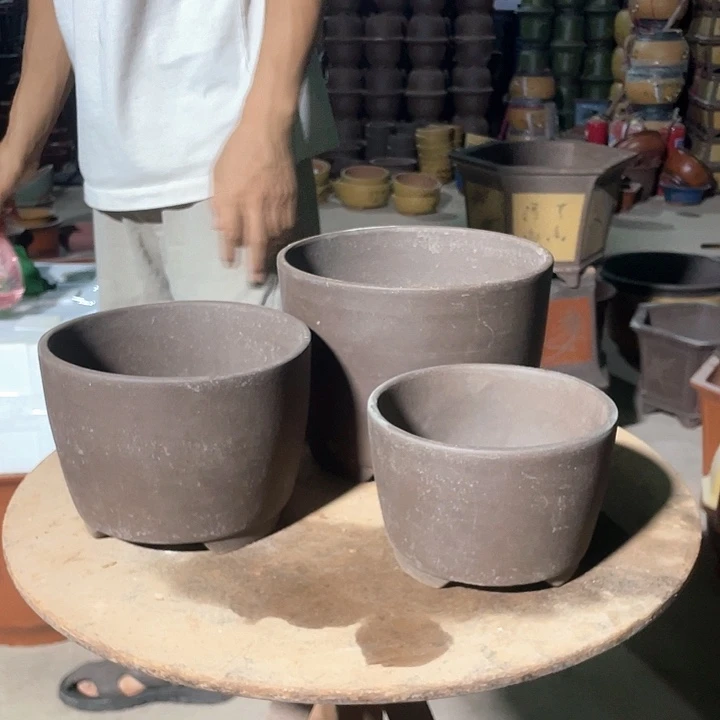 紫泥笔筒一组三个花盆