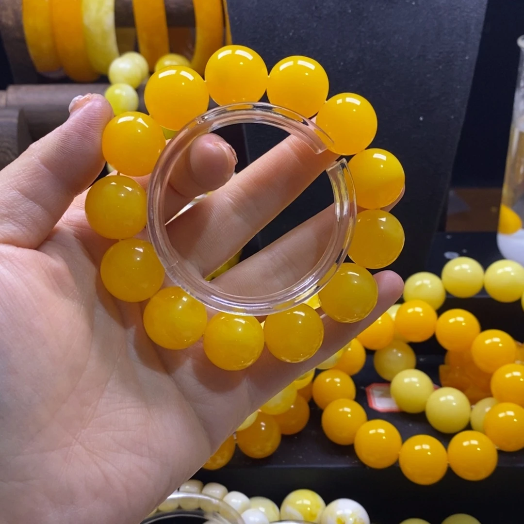 杜***к非金属鸡油黄卡18全品手串