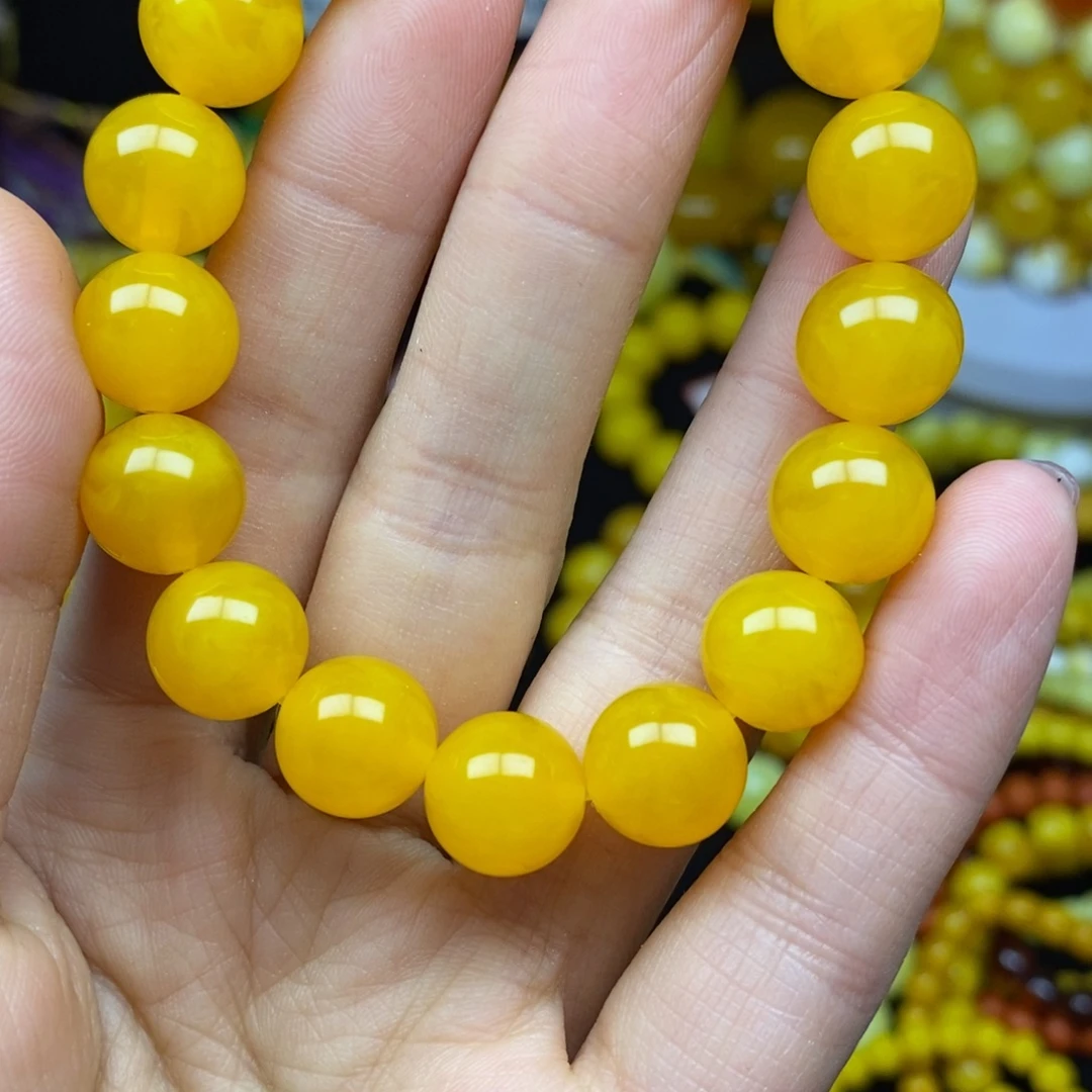 自***翔老蜡色鸡油红12手串一条