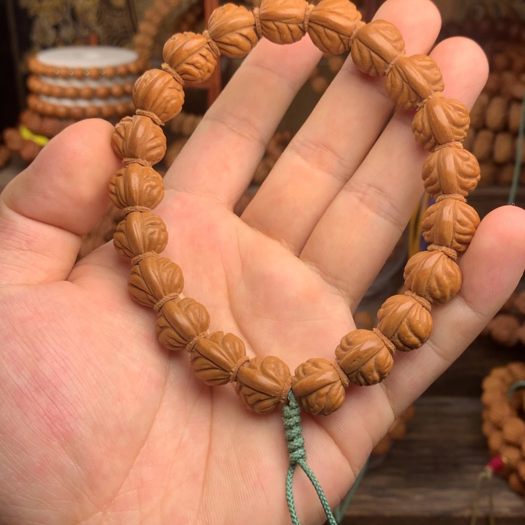 桃核吊坠14金豆 龙纹桃核