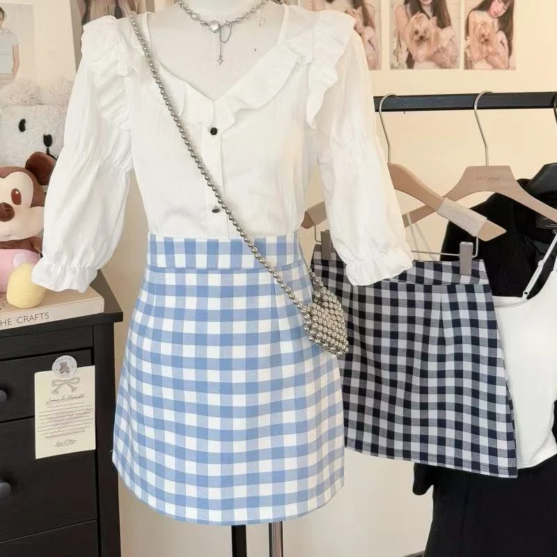 2025春夏“罗马假日”新复古主义风别具一格对格剪裁时髦半身裙