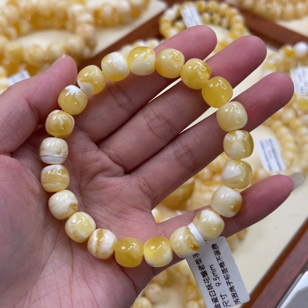 S***a蜜蜡未镶嵌手链9.5*9mm金瓷白妖花