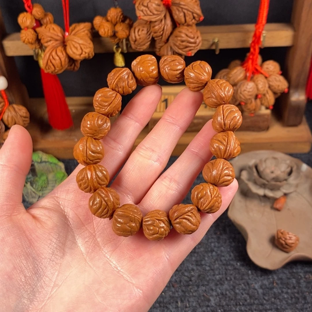 吊坠桃核桃枭手串