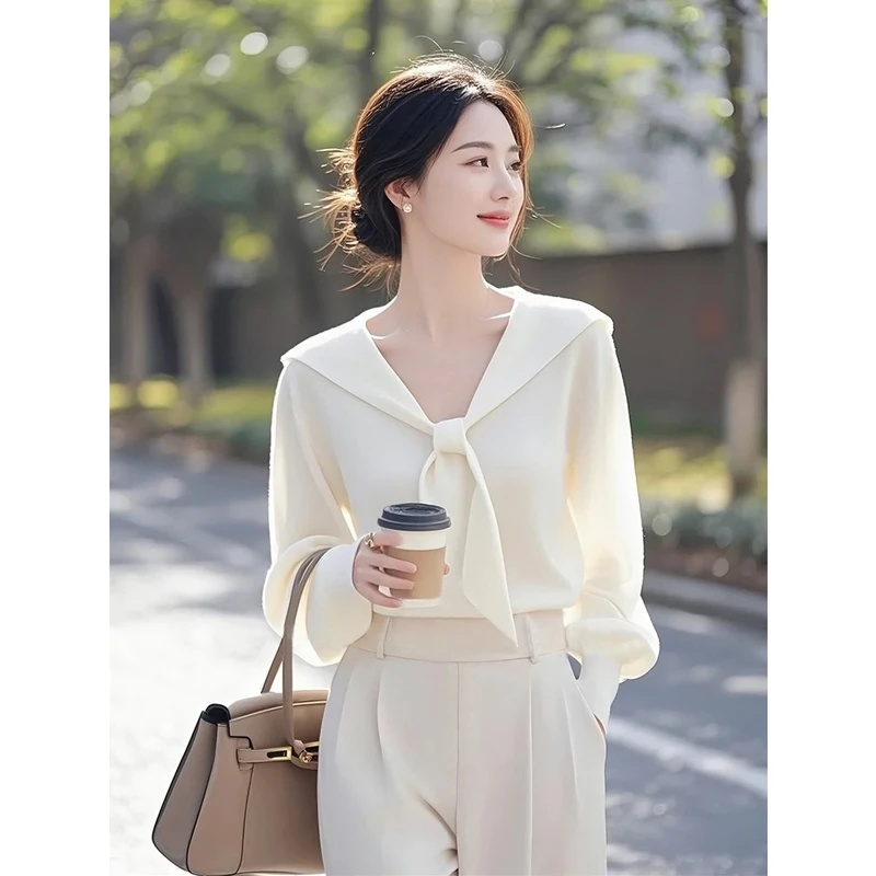 2025新款超好看独特漂亮气质上衣温柔风韩系白色v领针织衫女春