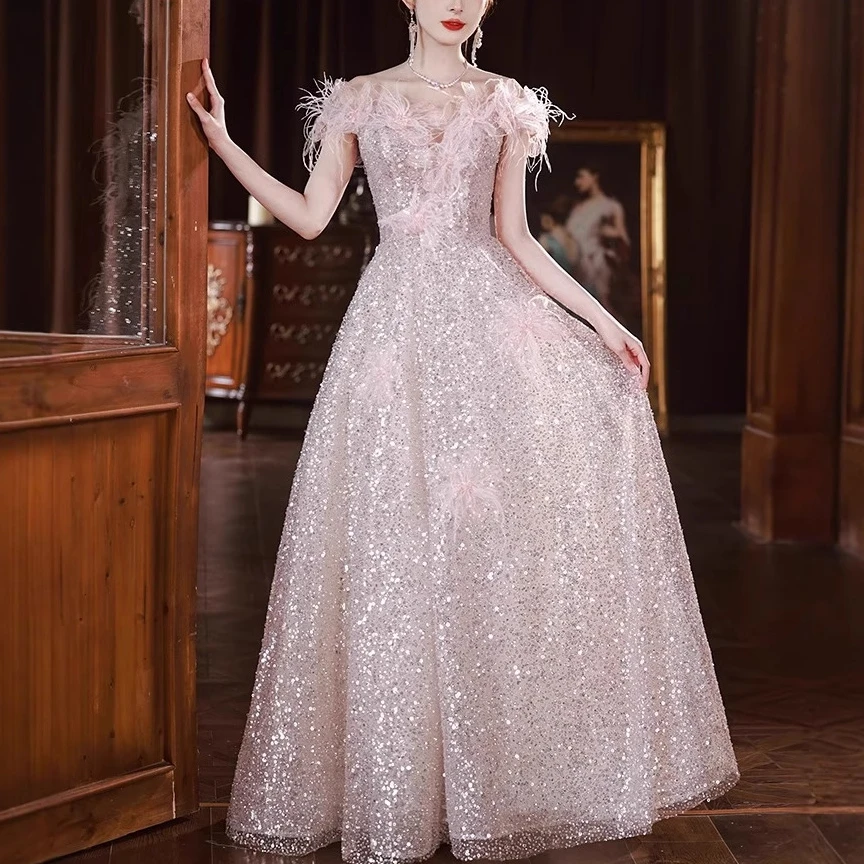 一字肩晚礼服裙新款轻奢羽毛款主持人年会亮片气质名媛宴会礼服裙