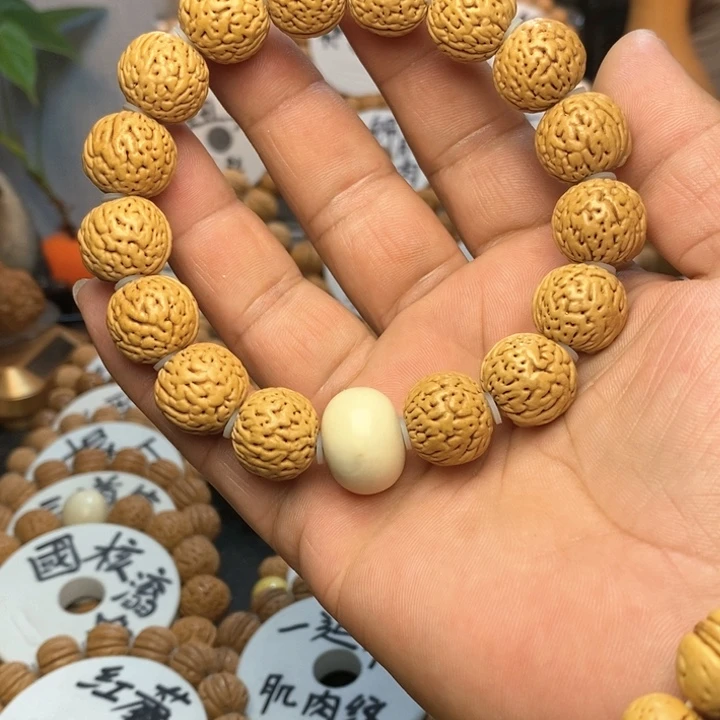 【闪购商品】邓**儿桃核手串花脐金豆