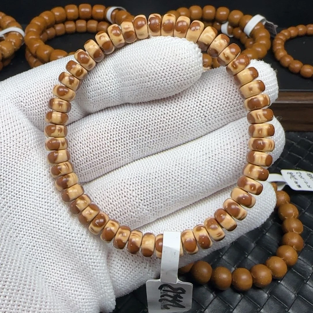 紫金鼠手串7.5*4mm纯肉三花药片233B