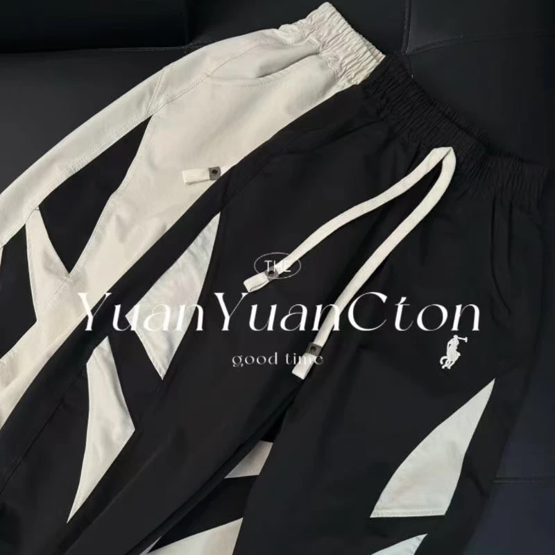 2025新款潮童百搭休闲黑白拼块百搭休闲阔腿弯道速干裤