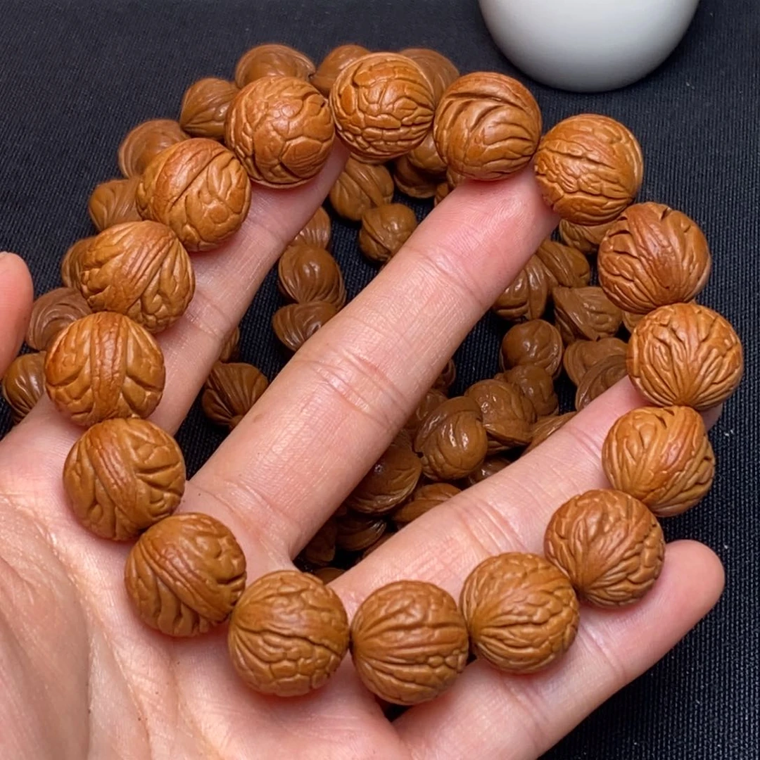 桃核吊坠秦岭龙纹桃核，1