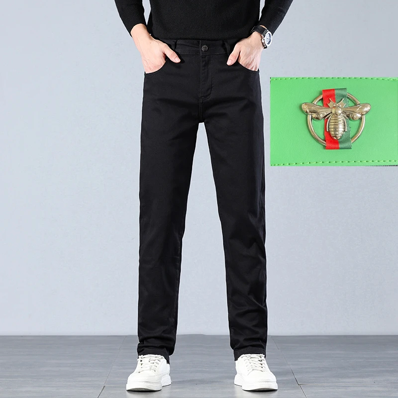 纯黑简约牛仔裤男士秋冬弹力时尚轻商务小直筒新款百搭裤子