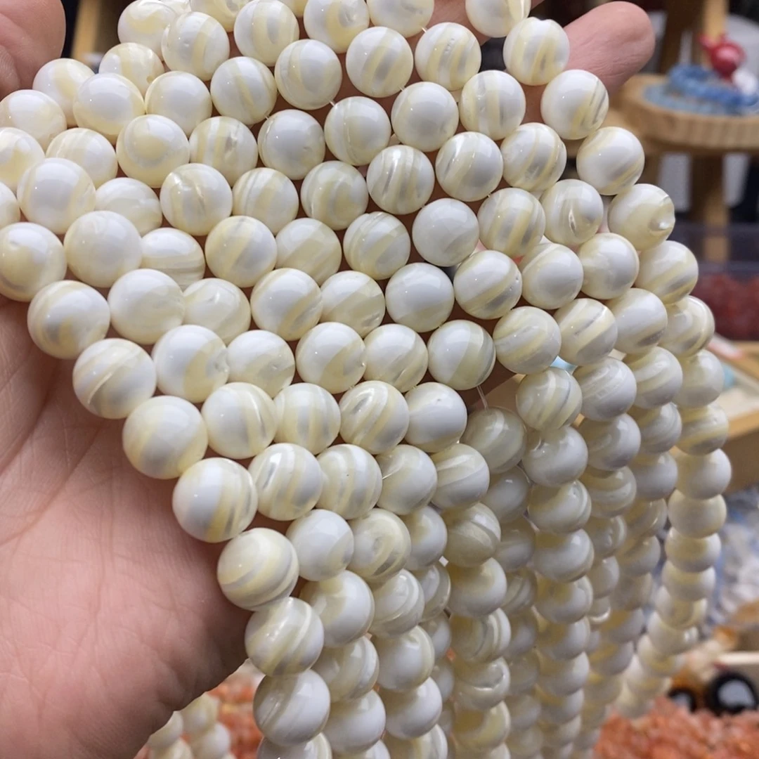 玛瑙/玉髓未镶嵌珠宝半成品一条天然10.5mm白马蹄螺贝壳