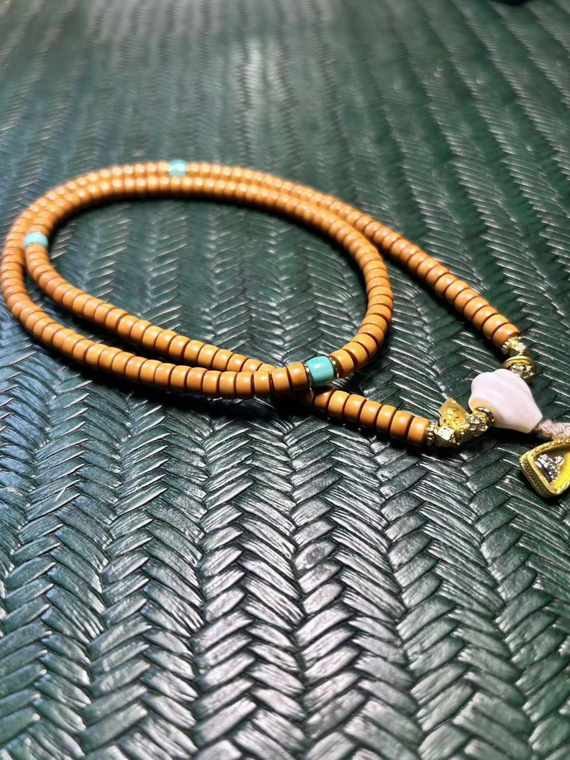 6.0MM精品橄榄核药片款脖挂长串