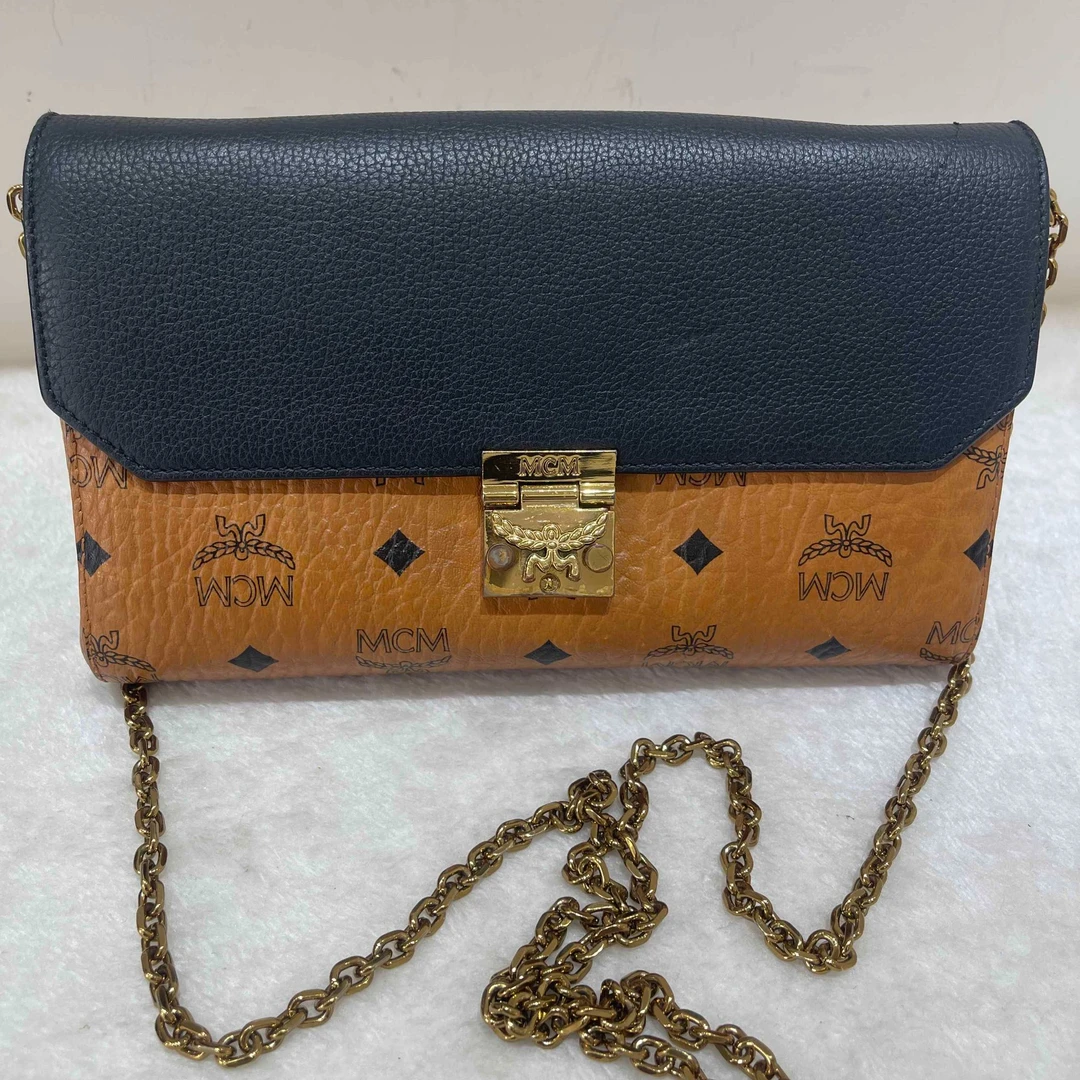 95新 MCM 干邑色老花拼皮woc信封包16439661