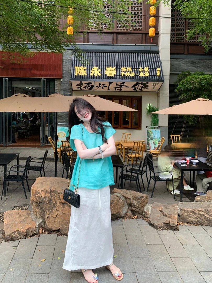 多巴胺穿搭一整套2025夏季新款后背绑带短袖衬衫高腰半身裙两件套