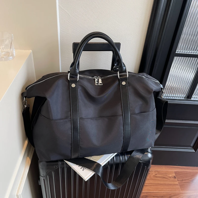 欧美时尚轻便旅行包男休闲出差旅游包女登机包大容量行李收纳包潮