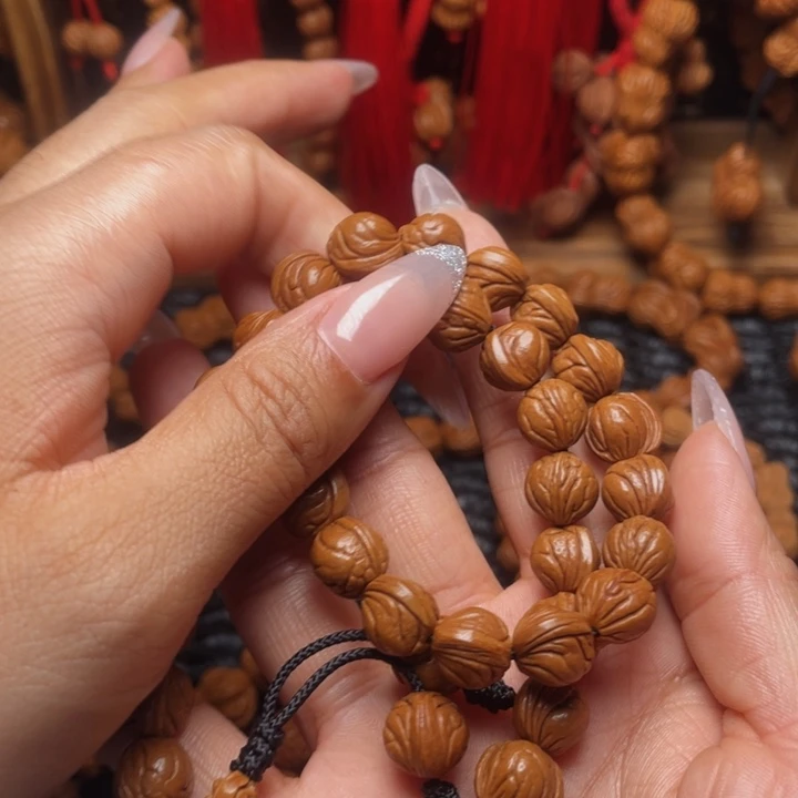 吸***¹菩提籽类龙纹桃枭挂件